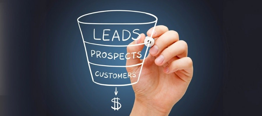 a hand drawing a sales funnel diagram with a marker to symbolize lead tracking